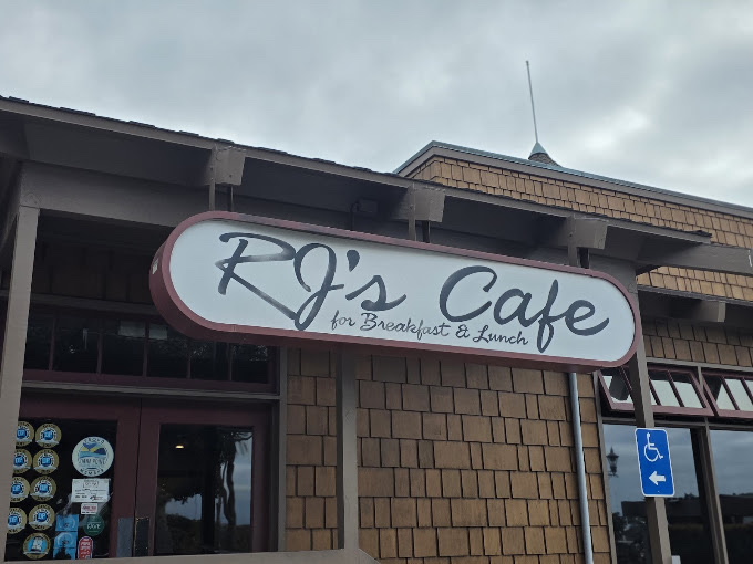RJ's Cafe hand-painted storefront sign, for breakfast and lunch